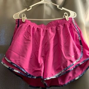 Pink Nike athletic shorts